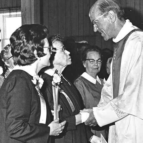 Cardinal George Flahiff congratulates Sister Catherine Donnelly