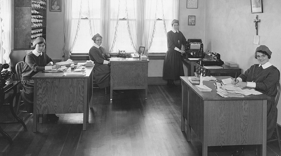 Sisters work in religious correspondence school office